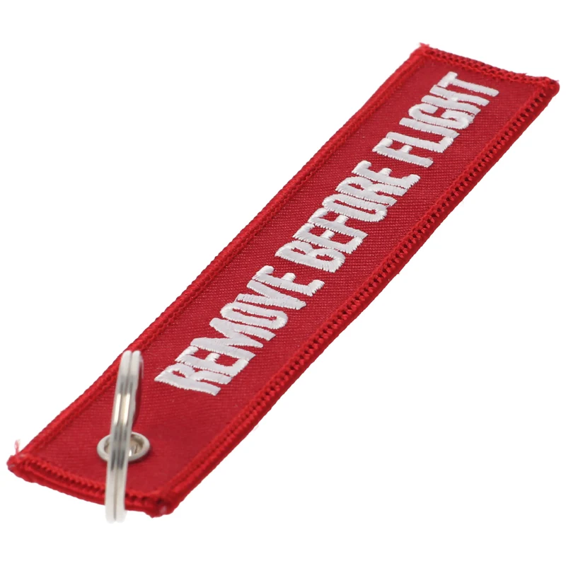 AccuCell Anhänger mit Schriftzug Remove before flight ca. 13 x 2,8 cm