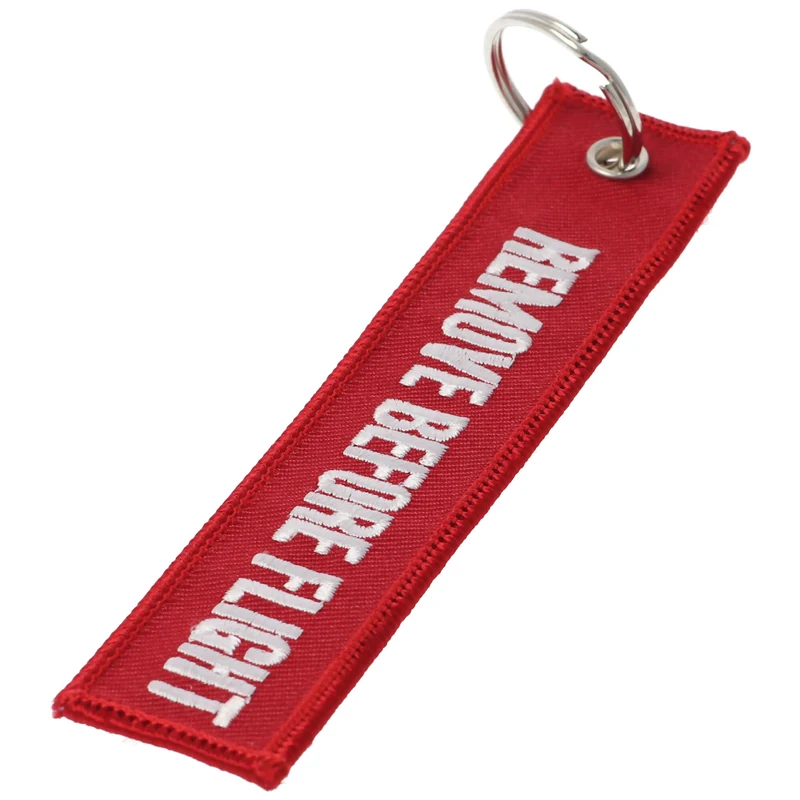 AccuCell Anhänger mit Schriftzug Remove before flight ca. 13 x 2,8 cm